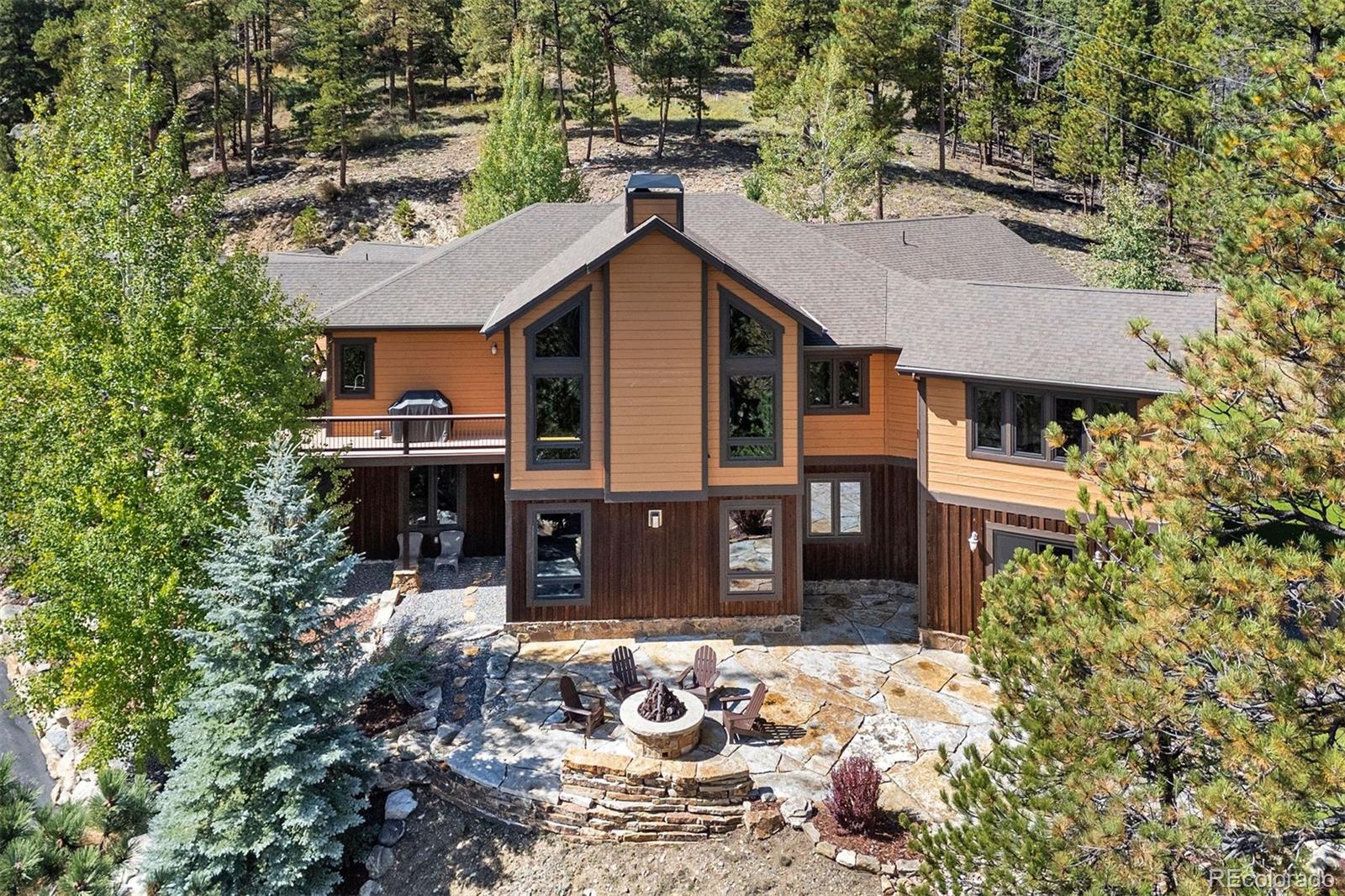 610 Clear Creek Road Evergreen, CO 80439 - Photo 47 of 50 a house view with a outdoor space