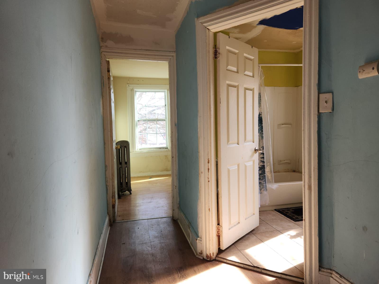 648 Kohn Street Norristown, PA 19401 - Photo 22 of 39 a view of a bathroom from a corridor