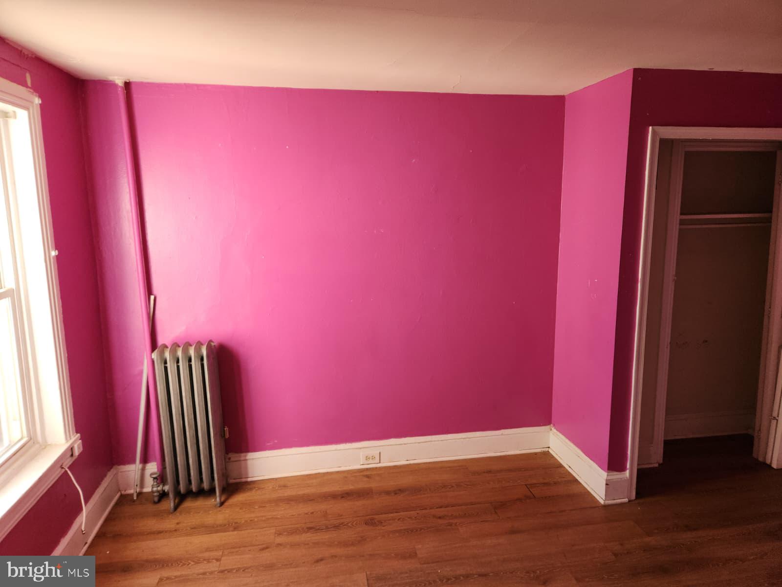 648 Kohn Street Norristown, PA 19401 - Photo 27 of 39 a view of a room with wooden floor and a large window