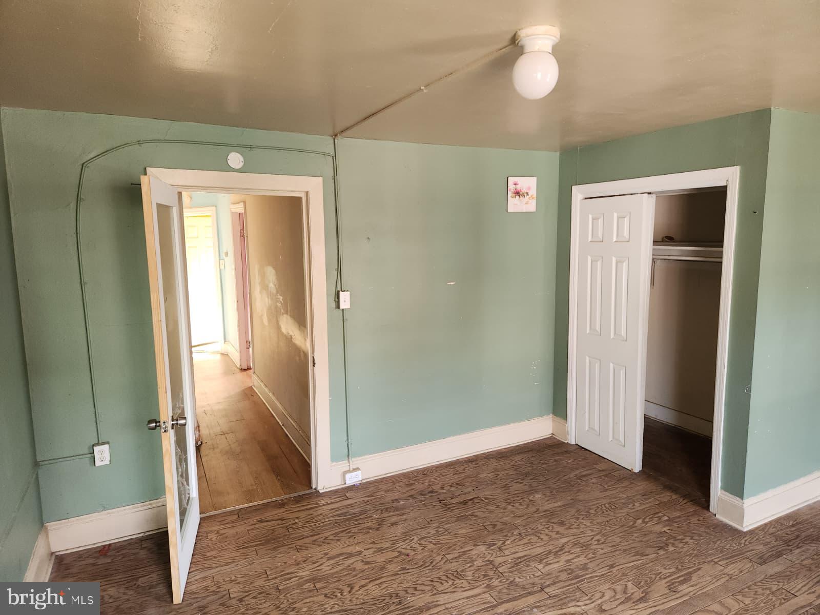 648 Kohn Street Norristown, PA 19401 - Photo 30 of 39 a view of a hallway with wooden shelves