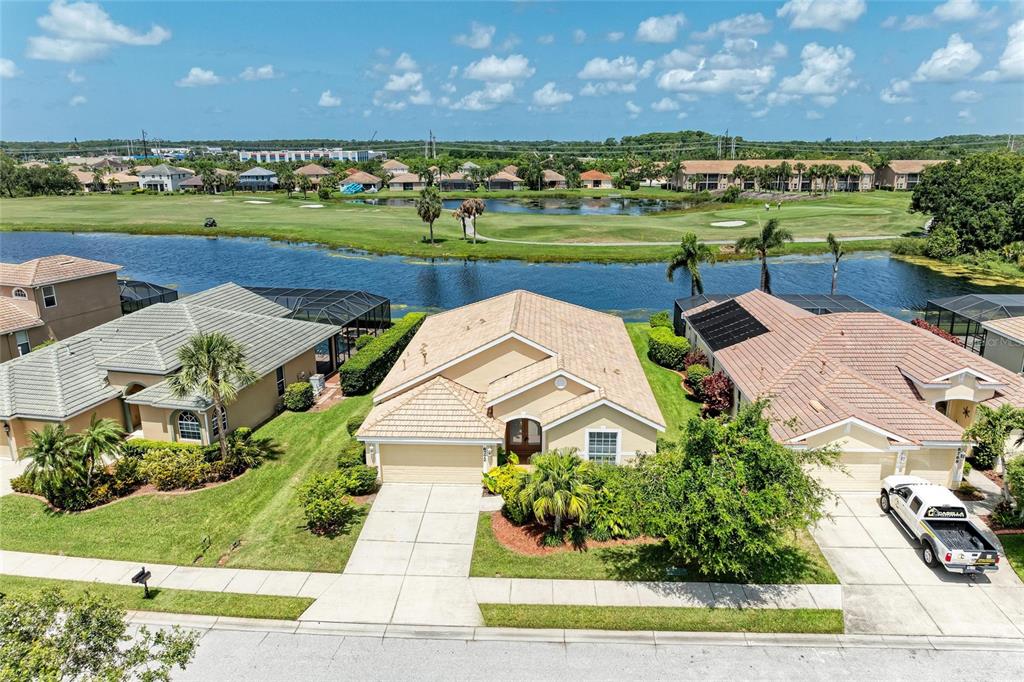 8772 Stone Harbour Loop Bradenton, FL 34212 - Photo 4 of 69 front view of a house with a yard