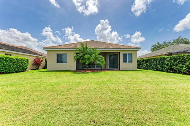 a view of a water fountain and a yard