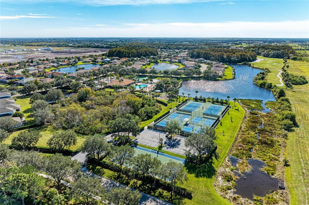 8772 Stone Harbour Loop Bradenton, FL 34212 - Photo 56 of 69 an aerial view of a house with a yard