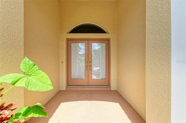 a view of a kitchen with a sink and cabinets