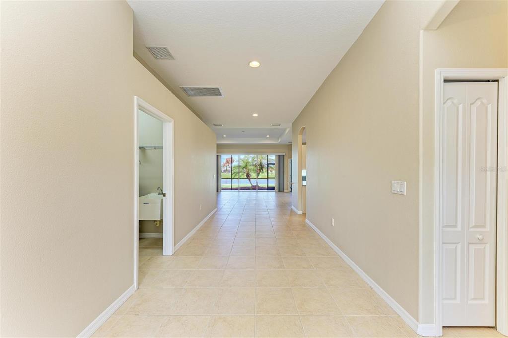 8772 Stone Harbour Loop Bradenton, FL 34212 - Photo 9 of 69 a view of hallway with wooden floor
