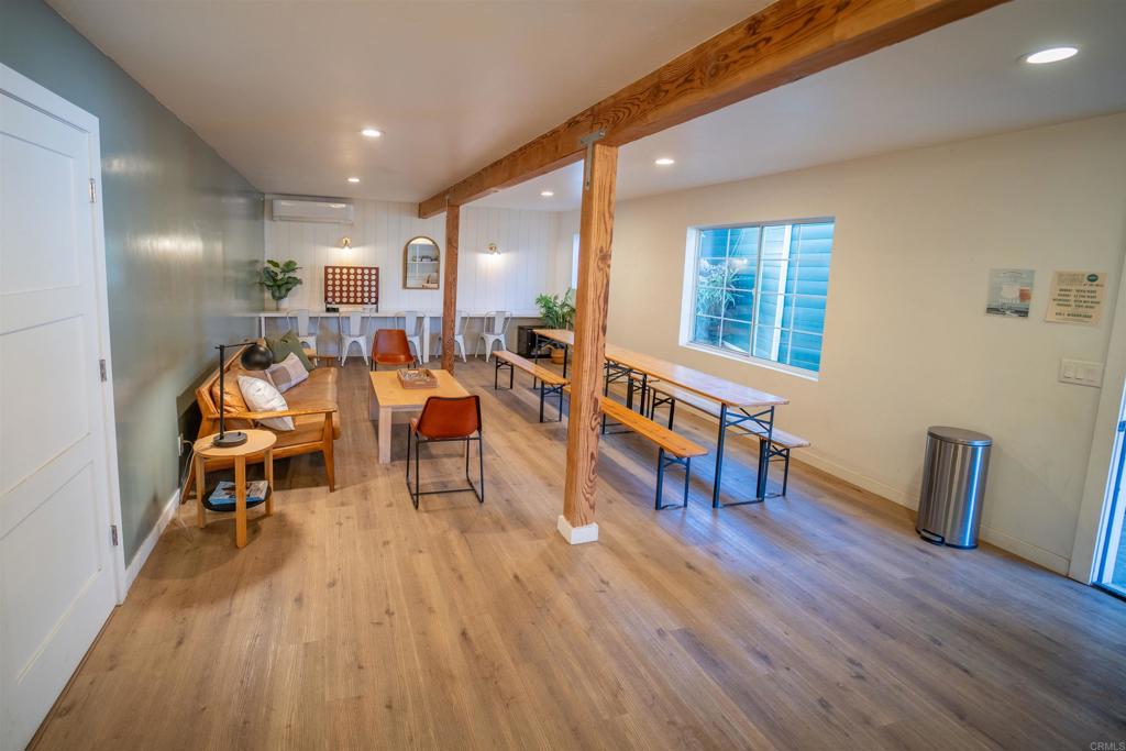 838 East Mission Road Fallbrook, CA 92028 - Photo 45 of 49 a living room with furniture and a wooden floor
