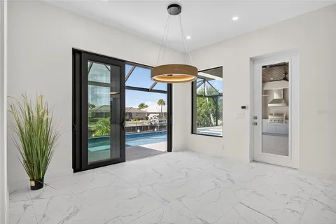 a view of livingroom with furniture and a potted plant