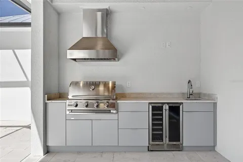 a kitchen with a stove and a microwave