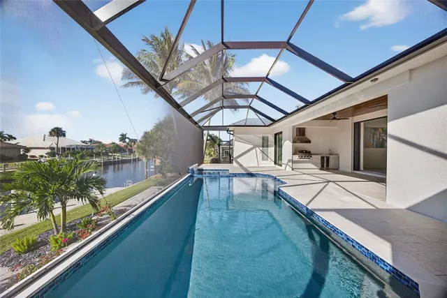 a view of a swimming pool with a patio