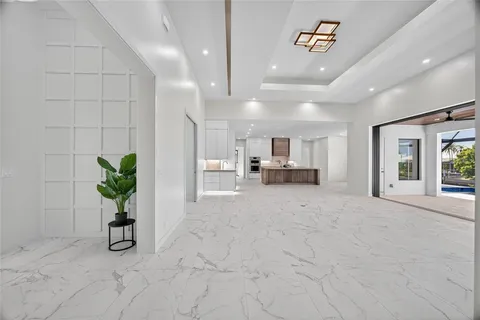 a view of livingroom with furniture and a potted plant