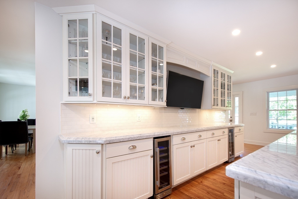 584 Hatherly Road Scituate, MA 02066 - Photo 14 of 42 a kitchen with a sink and cabinets