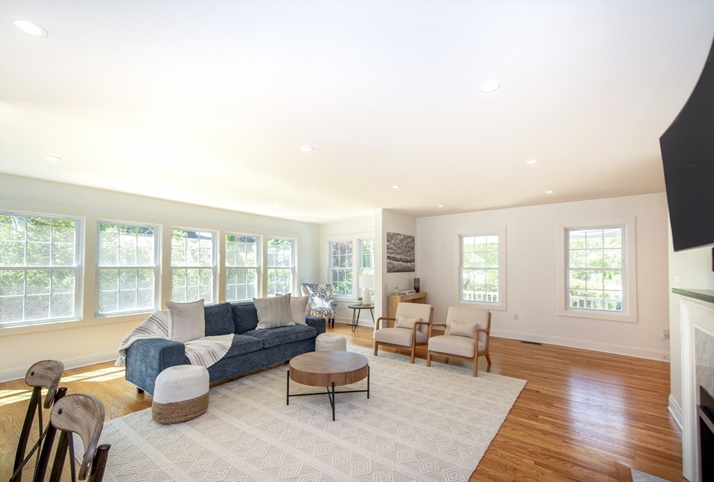 584 Hatherly Road Scituate, MA 02066 - Photo 18 of 42 a living room with furniture and a large window