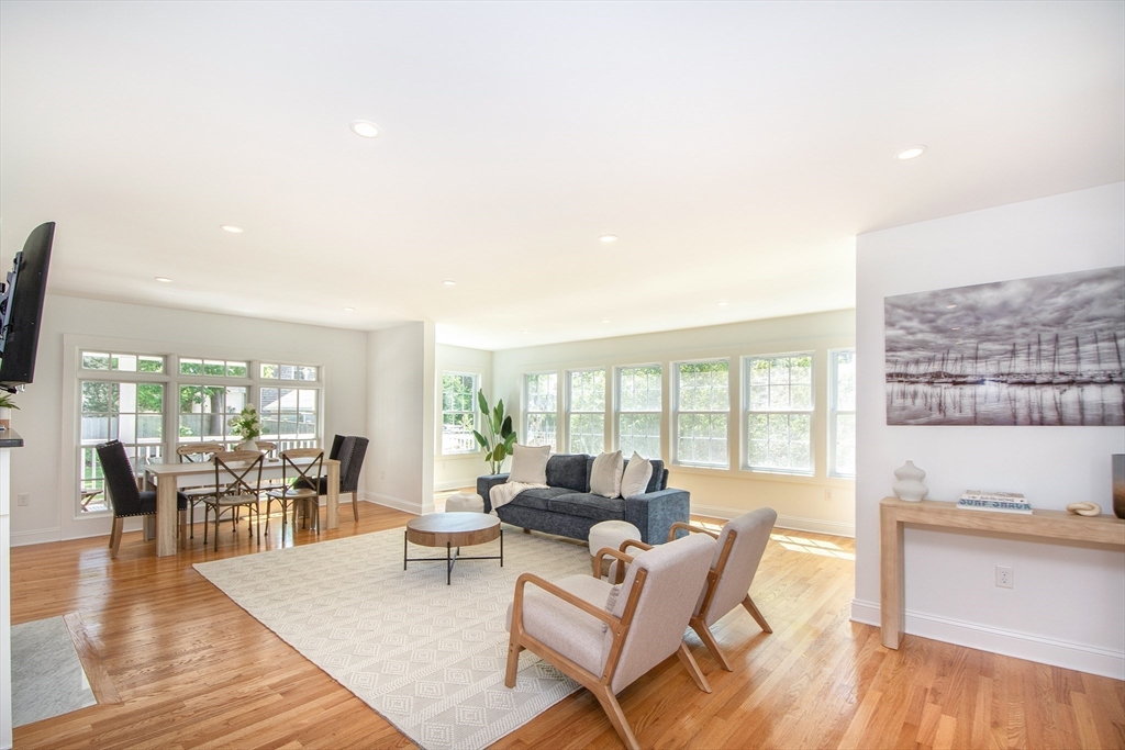 584 Hatherly Road Scituate, MA 02066 - Photo 19 of 42 a living room with furniture and a wooden floor