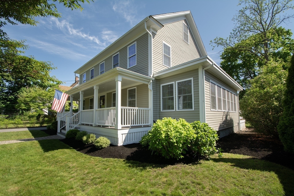 584 Hatherly Road Scituate, MA 02066 - Photo 2 of 42 a front view of a house with a yard