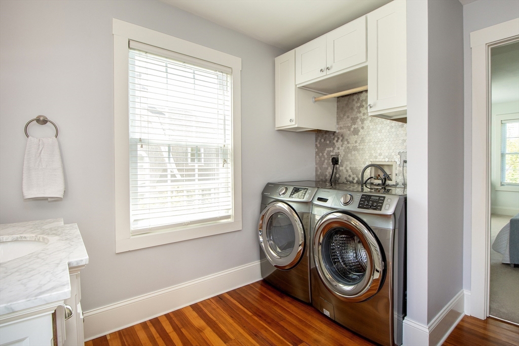 584 Hatherly Road Scituate, MA 02066 - Photo 22 of 42 a view of livingroom with washer and dryer
