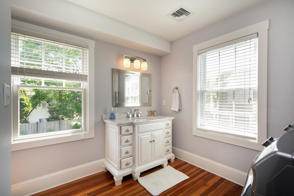 584 Hatherly Road Scituate, MA 02066 - Photo 23 of 42 a bedroom with furniture and a window
