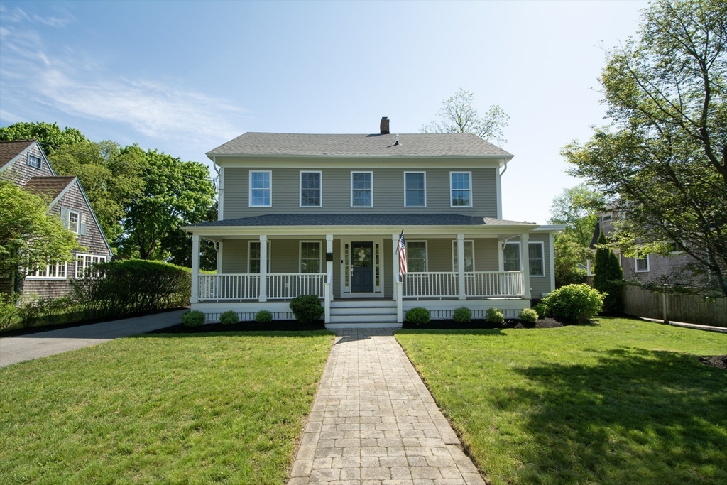 584 Hatherly Road Scituate, MA 02066 - Photo 3 of 42 a front view of a house with a yard