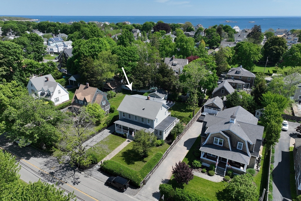 584 Hatherly Road Scituate, MA 02066 - Photo 40 of 42 an aerial view of a house with a yard