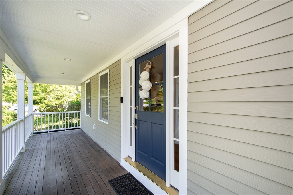 584 Hatherly Road Scituate, MA 02066 - Photo 6 of 42 a view of a porch with wooden floor and outdoor space