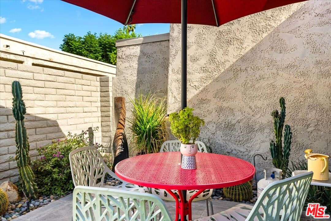 1111 East Ramon Road, Unit 17 Palm Springs, CA 92264 - Photo 19 of 34 a outdoor space with furniture