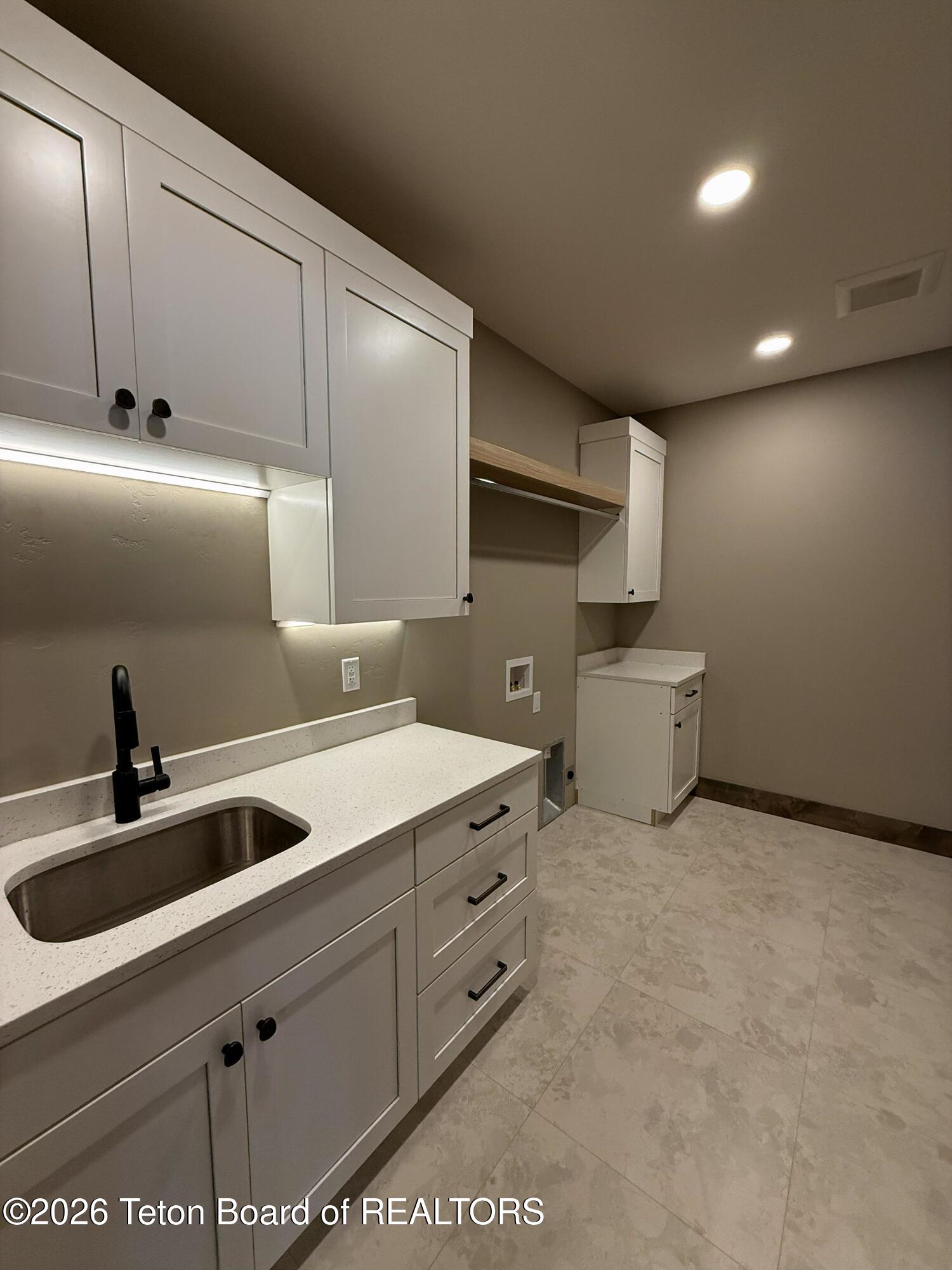 5727 Forest Ridge Road Victor, ID 83455 - Photo 54 of 76 Lower Level Laundry Room