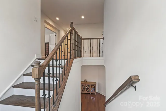 a view of entryway with wooden floor