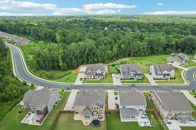 an aerial view of a house with a garden