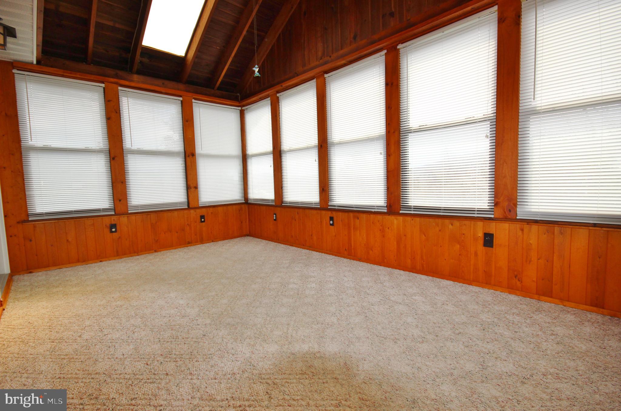 312 Granny Smith Road Linden, VA 22642 - Photo 15 of 59 Enclosed sunroom with AC