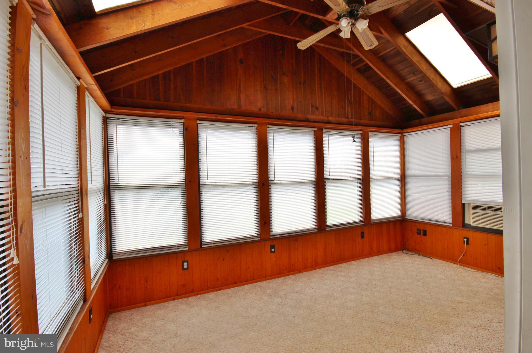 312 Granny Smith Road Linden, VA 22642 - Photo 16 of 59 Sun room vaulted ceiling and fan.