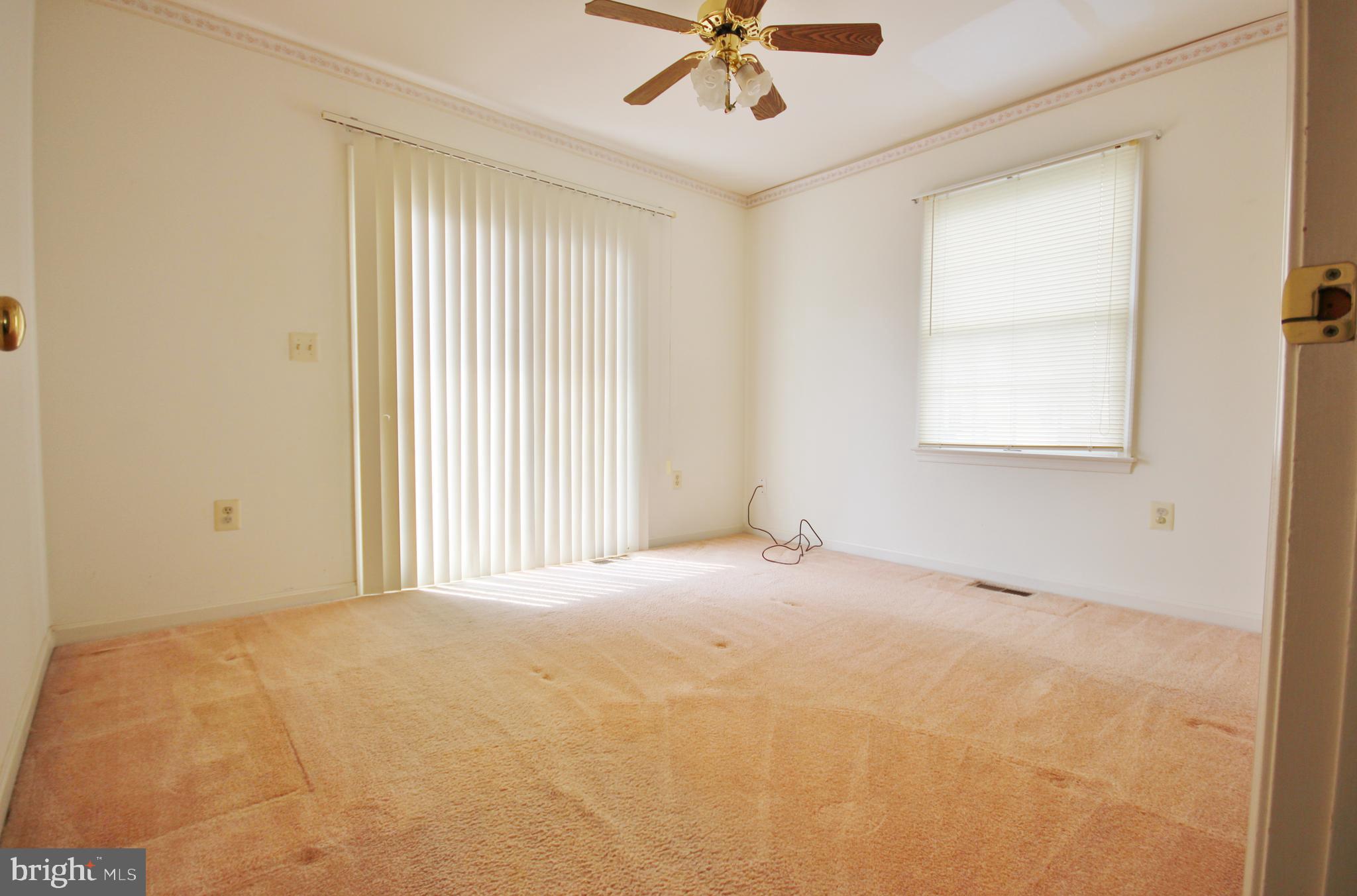 312 Granny Smith Road Linden, VA 22642 - Photo 19 of 59 Rear main level bedroom, w/door to deck