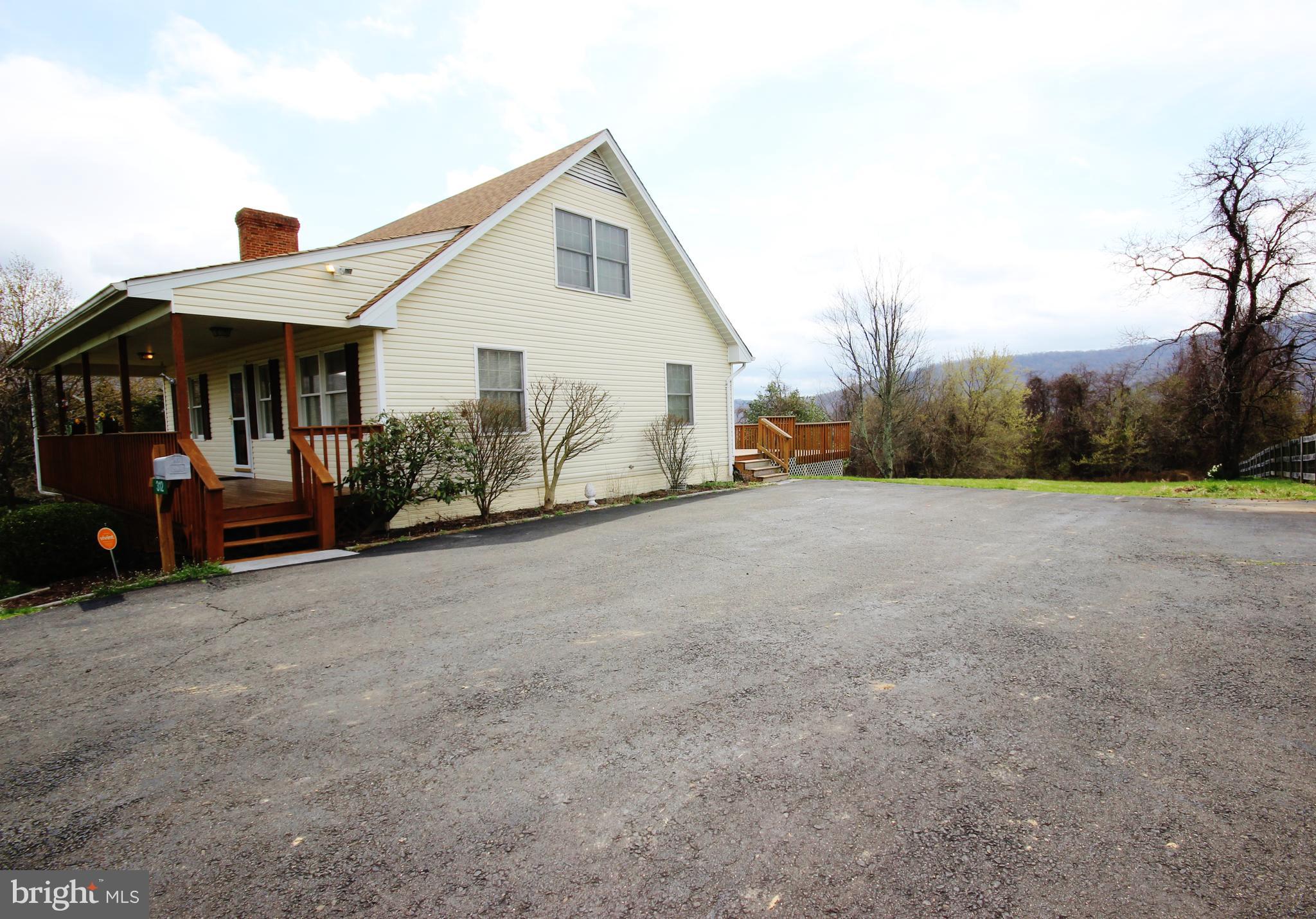 312 Granny Smith Road Linden, VA 22642 - Photo 41 of 59 Paved driveway with lots of parking or play area!