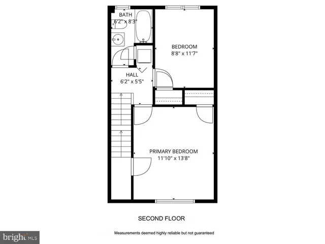 a picture of a bench in front of a wall