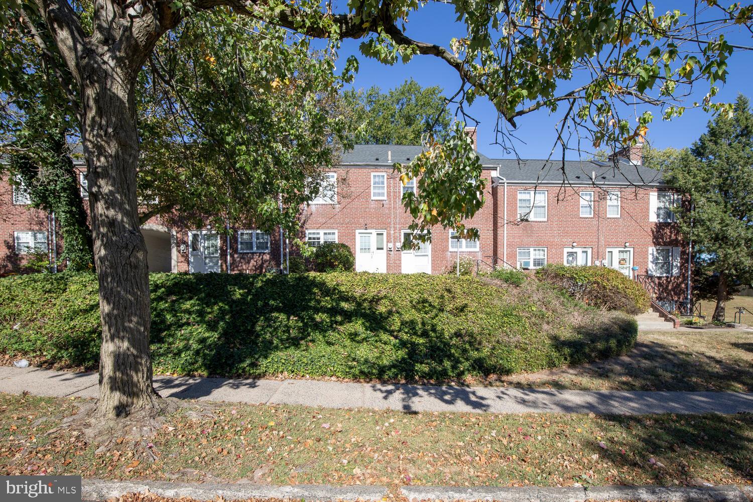 200 Maplewood Drive, Unit CONDO 4 Pottstown, PA 19464 - Photo 8 of 8 a front view of a house with a yard