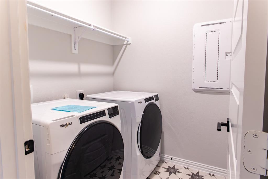 2604 Freeman Street Anna, TX 75409 - Photo 13 of 18 a utility room with dryer and washer