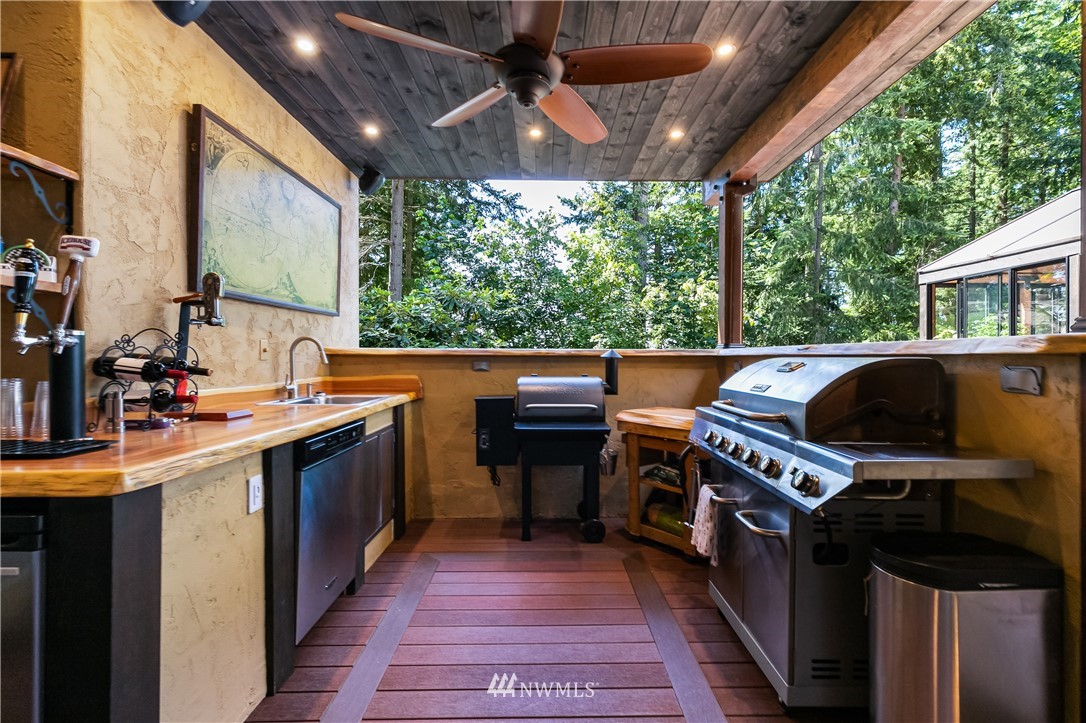 654 Clark Road Bellingham, WA 98225 - Photo 14 of 40 a open kitchen with stainless steel appliances granite countertop a stove and a sink