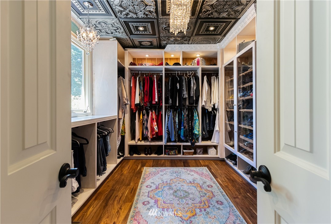 654 Clark Road Bellingham, WA 98225 - Photo 26 of 40 a view of walk in closet with clothes
