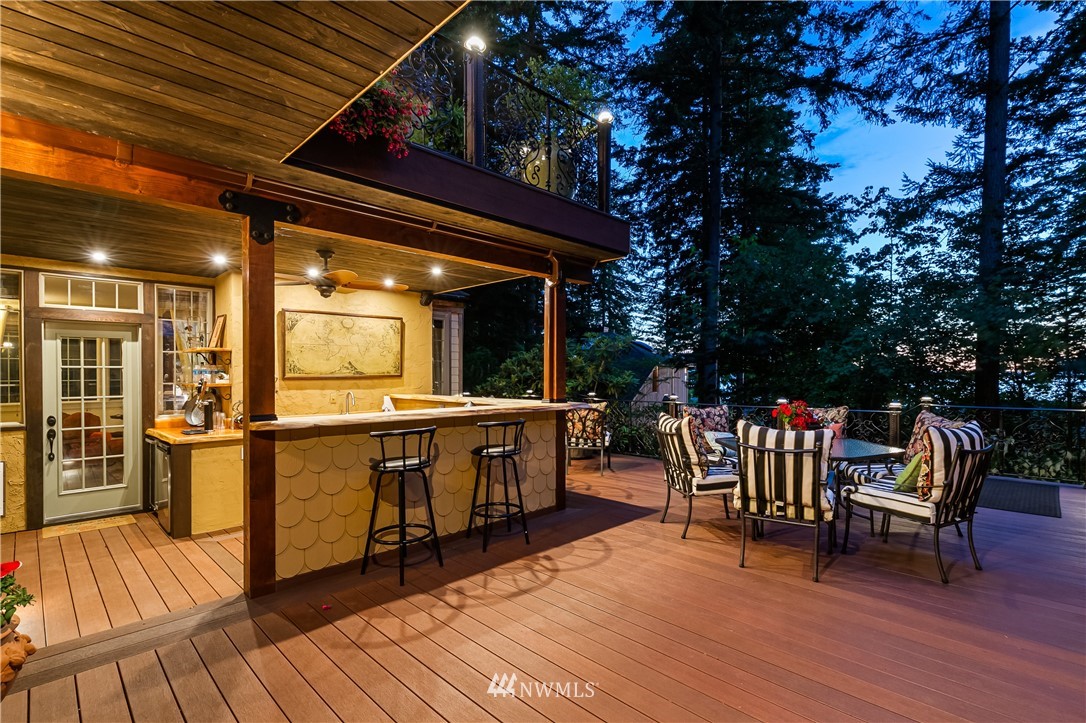 654 Clark Road Bellingham, WA 98225 - Photo 7 of 40 a outdoor dining space with furniture and wooden floor