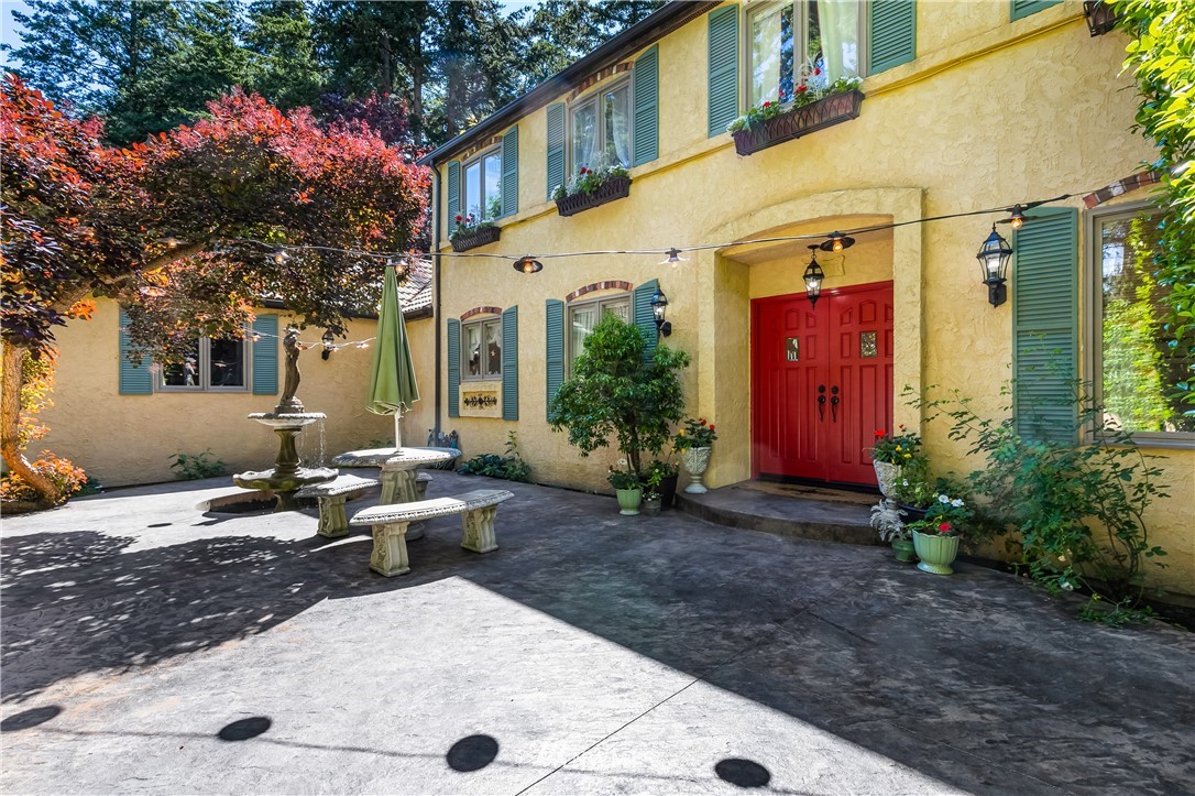 654 Clark Road Bellingham, WA 98225 - Photo 8 of 40 a view of a house with backyard and sitting area