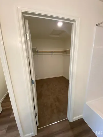 a bathroom with a sink a mirror and a bathtub