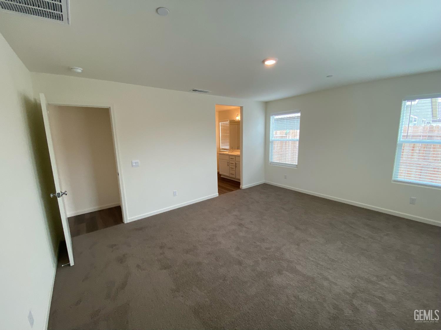 Undisclosed Address Bakersfield, CA 93313 - Photo 6 of 26 an empty room with windows