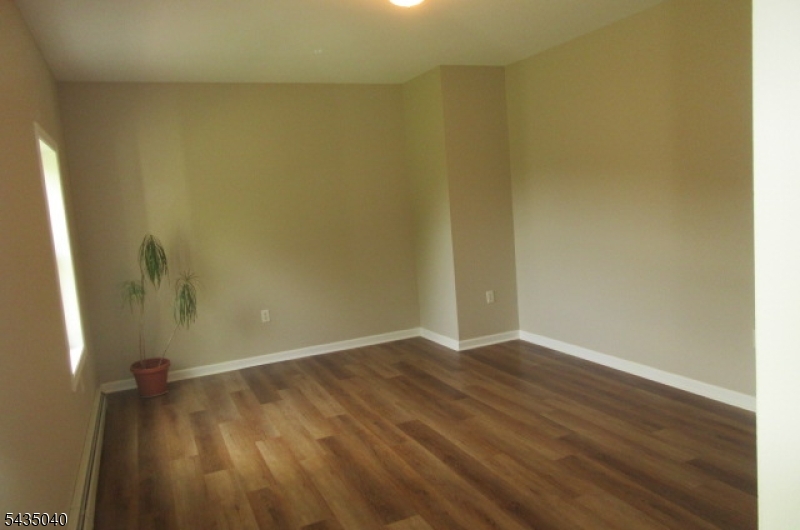 28 Beaver Run Road Lafayette, NJ 07848 - Photo 24 of 36 a view of an empty room with wooden floor