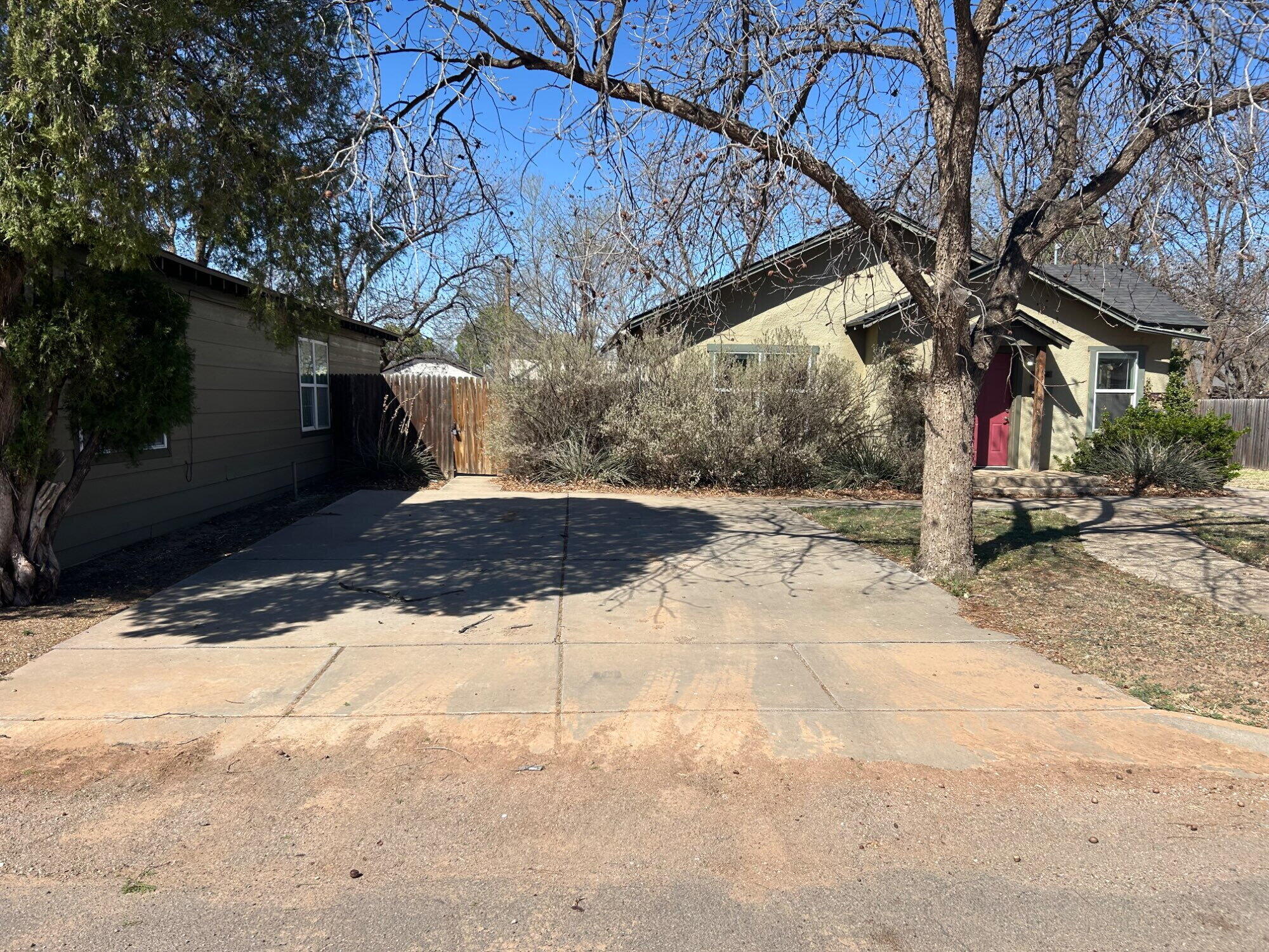 3118 37th Street, Unit FRONT Lubbock, TX 79413 - Photo 16 of 16 a view of a backyard of the house