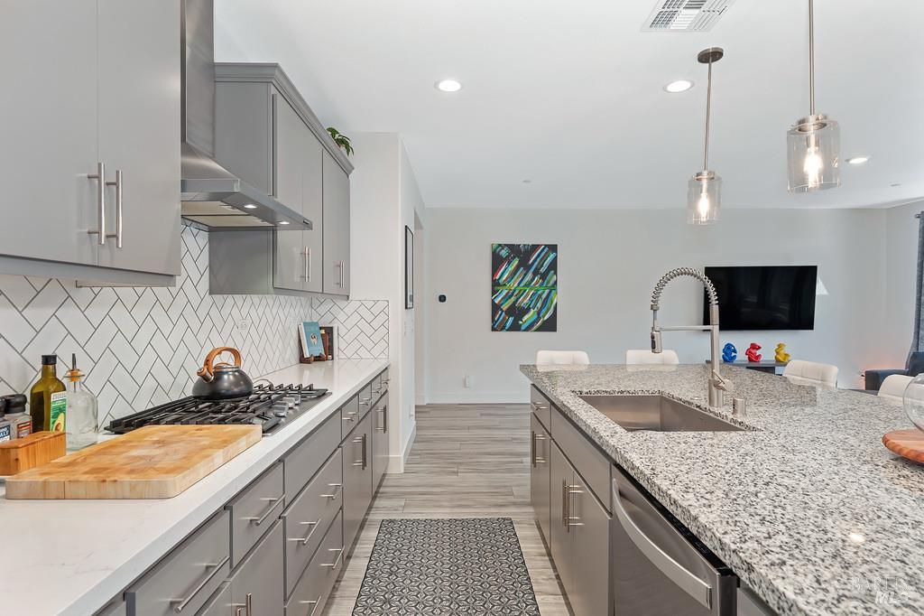 5708 Kassandra Place Rohnert Park, CA 94928 - Photo 17 of 45 a kitchen with granite countertop a sink a counter top space and cabinets