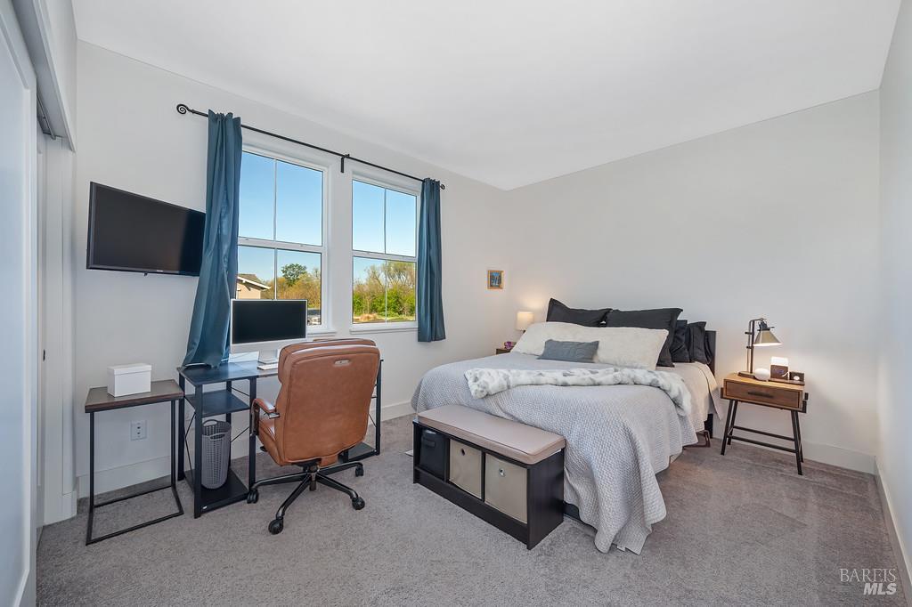 5708 Kassandra Place Rohnert Park, CA 94928 - Photo 18 of 45 a bedroom with a bed a desk and chair