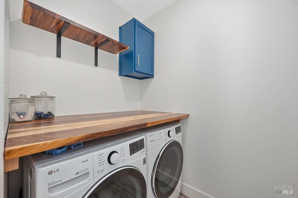 5708 Kassandra Place Rohnert Park, CA 94928 - Photo 25 of 45 a utility room with dryer and washer
