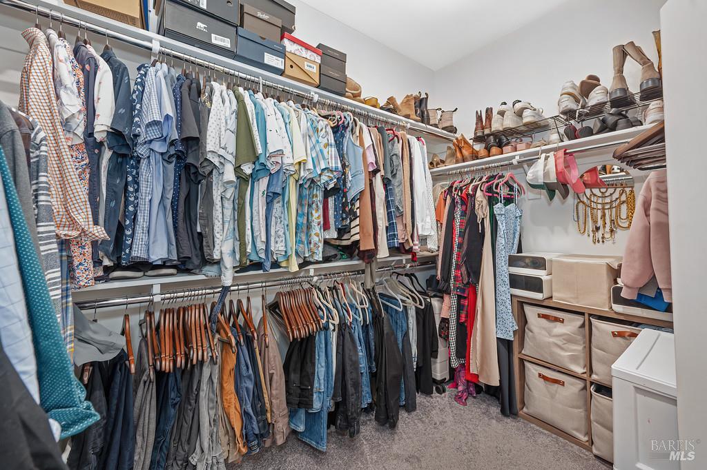 5708 Kassandra Place Rohnert Park, CA 94928 - Photo 32 of 45 a view of walk in closet with clothes
