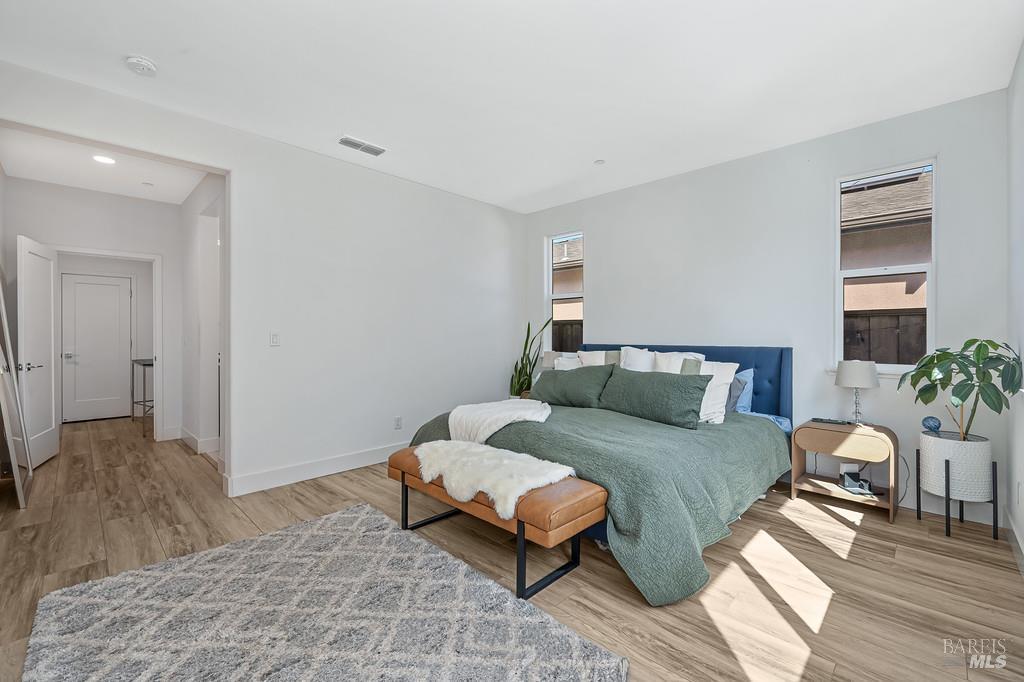 5708 Kassandra Place Rohnert Park, CA 94928 - Photo 34 of 45 a bedroom with a bed and a couch