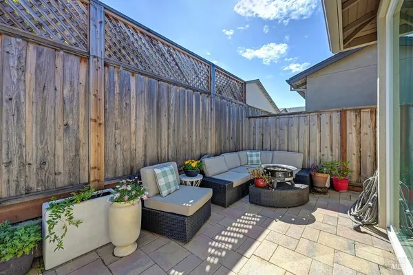 a outdoor living space with furniture and a potted plant