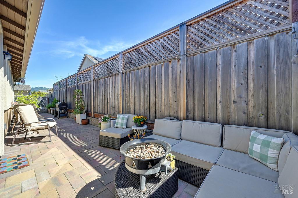 5708 Kassandra Place Rohnert Park, CA 94928 - Photo 39 of 45 a living room with furniture and a fireplace