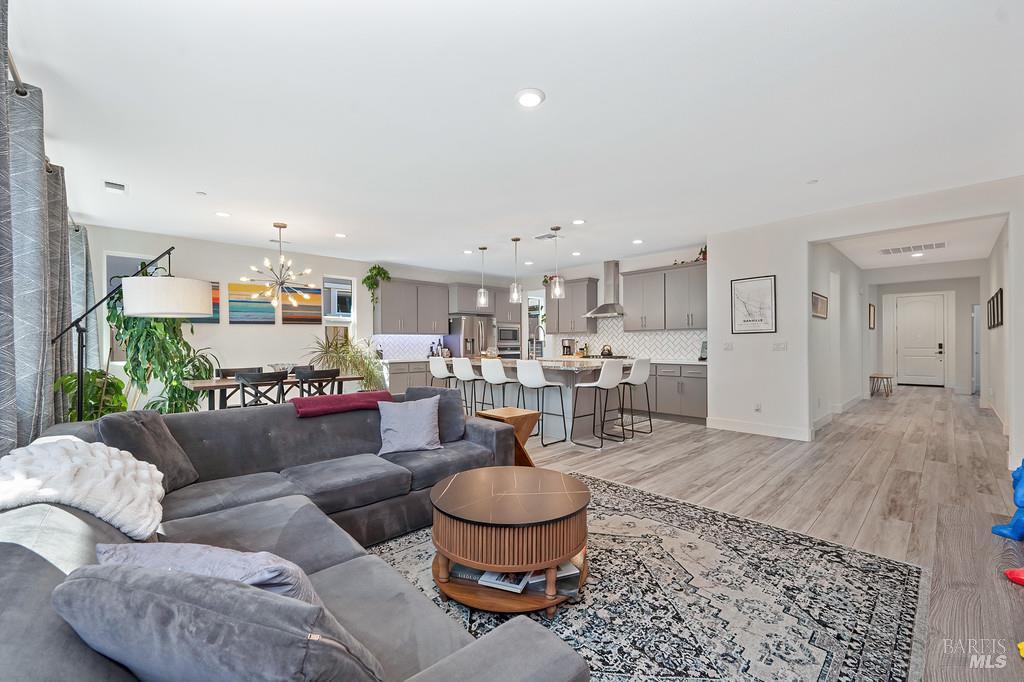 5708 Kassandra Place Rohnert Park, CA 94928 - Photo 8 of 45 a living room with furniture and a rug